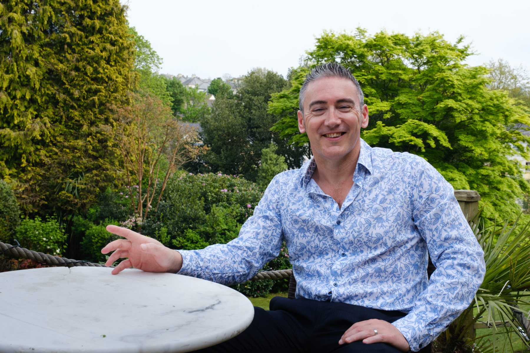 James Sowden outdoors at a table