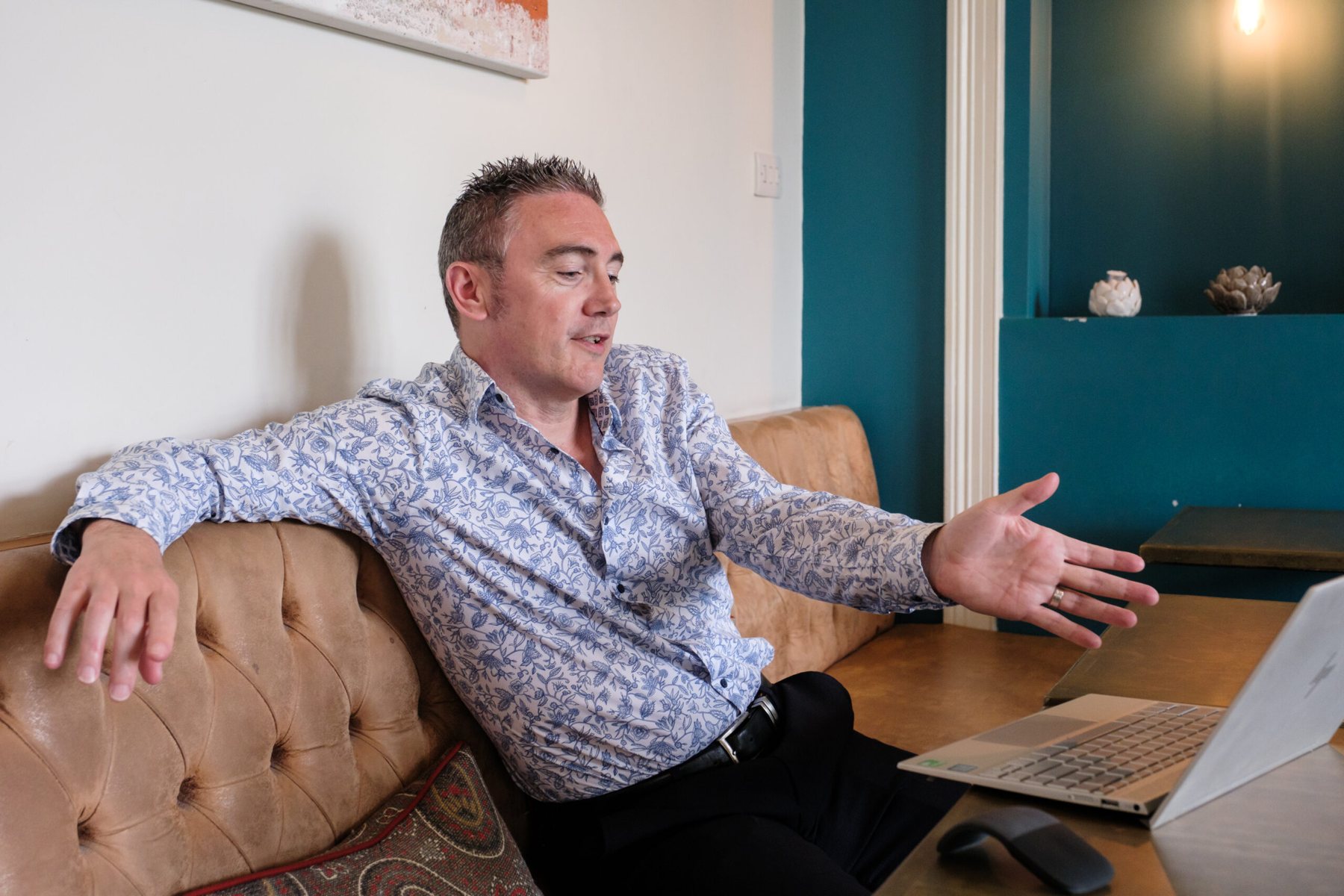James Sowden discussing business finance from a laptop