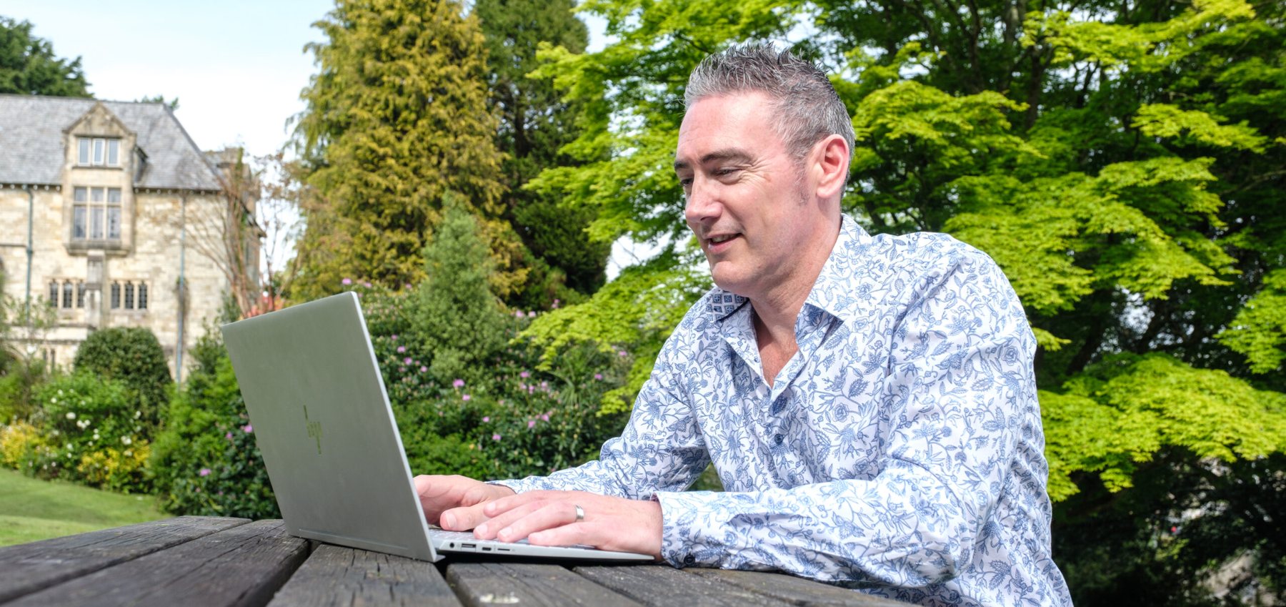 James Sowden working remotely on a laptop